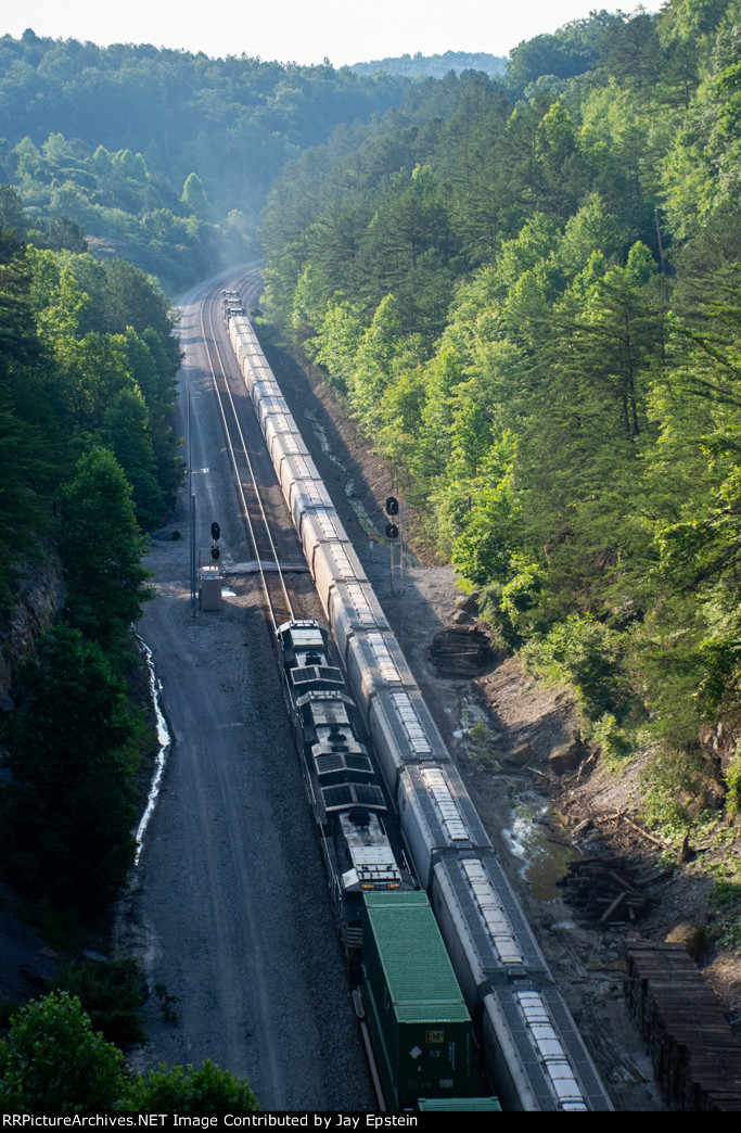 29A roars past a grain train at Keno Road 